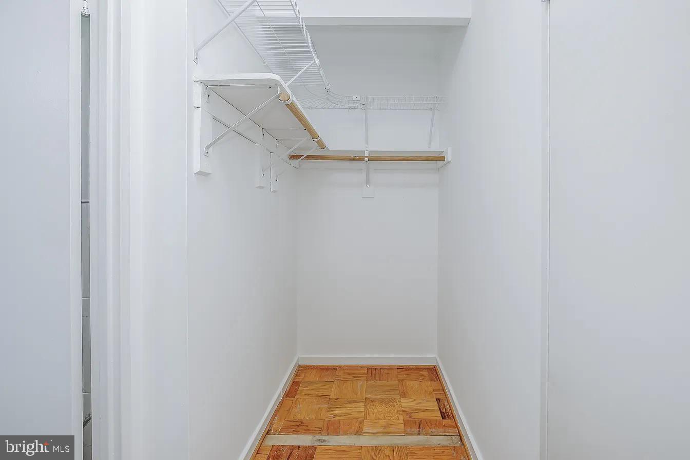 1250 4th Street Southwest, Unit W403 Washington, DC 20024 - Photo 16 of 30 a view of a room with racks on the wall