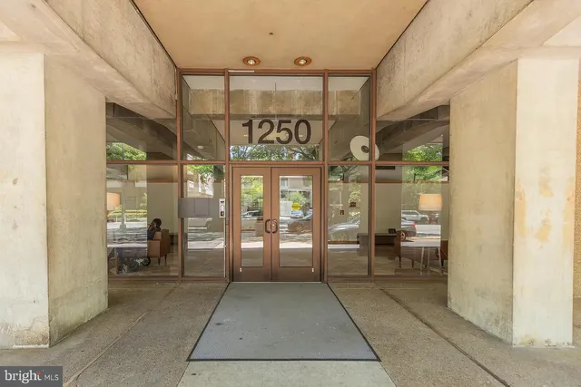 a view of a chairs and table in the patio