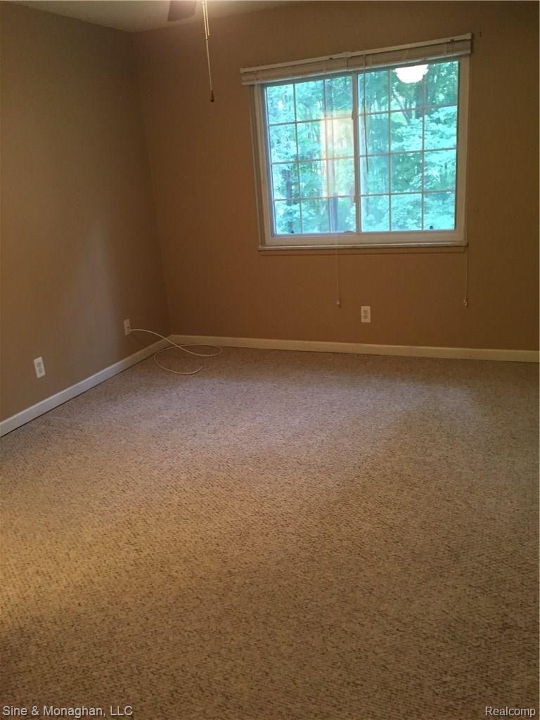 8192 24 Mile Road Utica, MI 48316 - Photo 22 of 26 Large bright window overlooking wooded area - in Bedroom