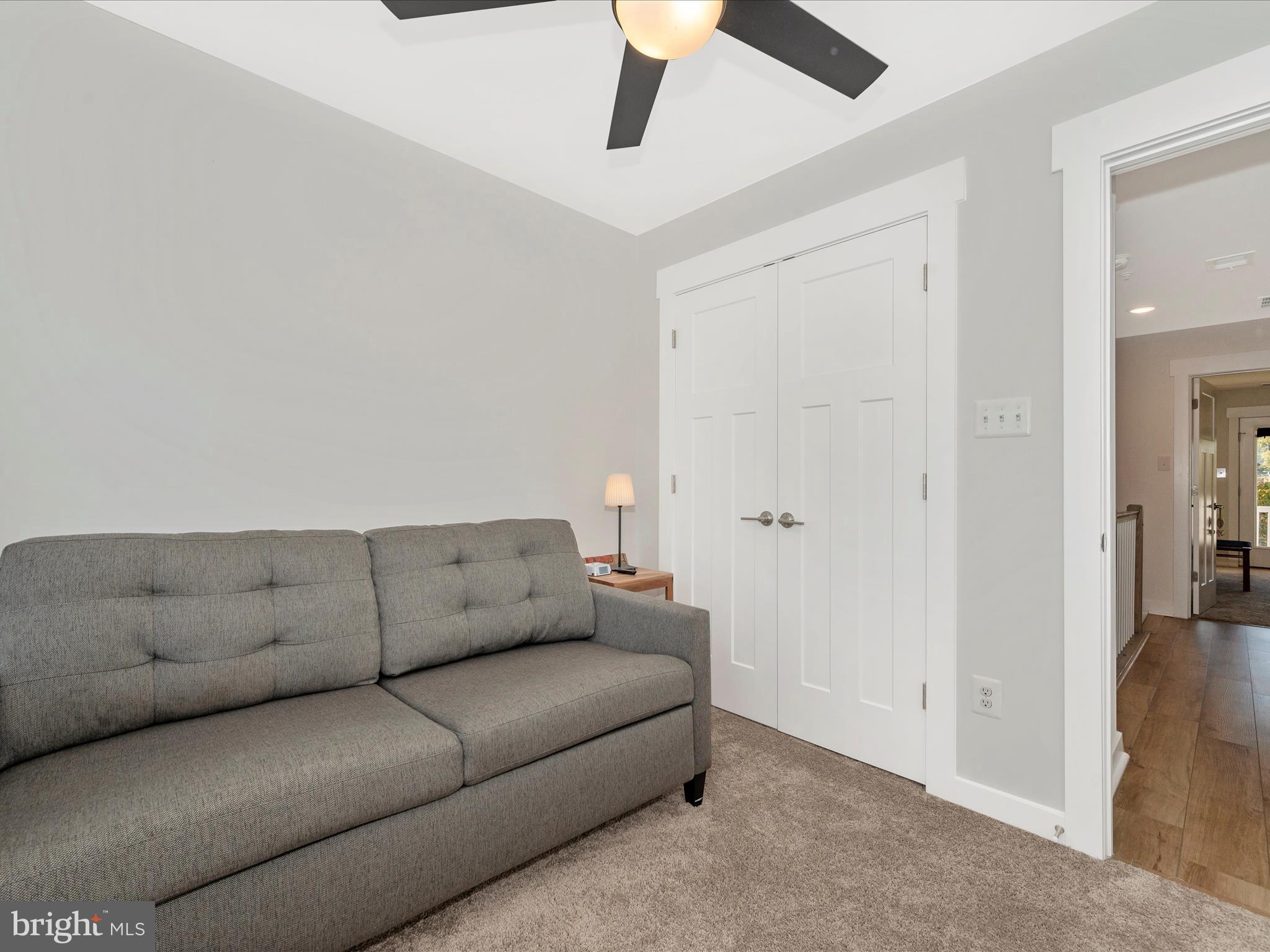 740 Tatum Court Frederick, MD 21702 - Photo 34 of 53 a living room with furniture and a ceiling fan