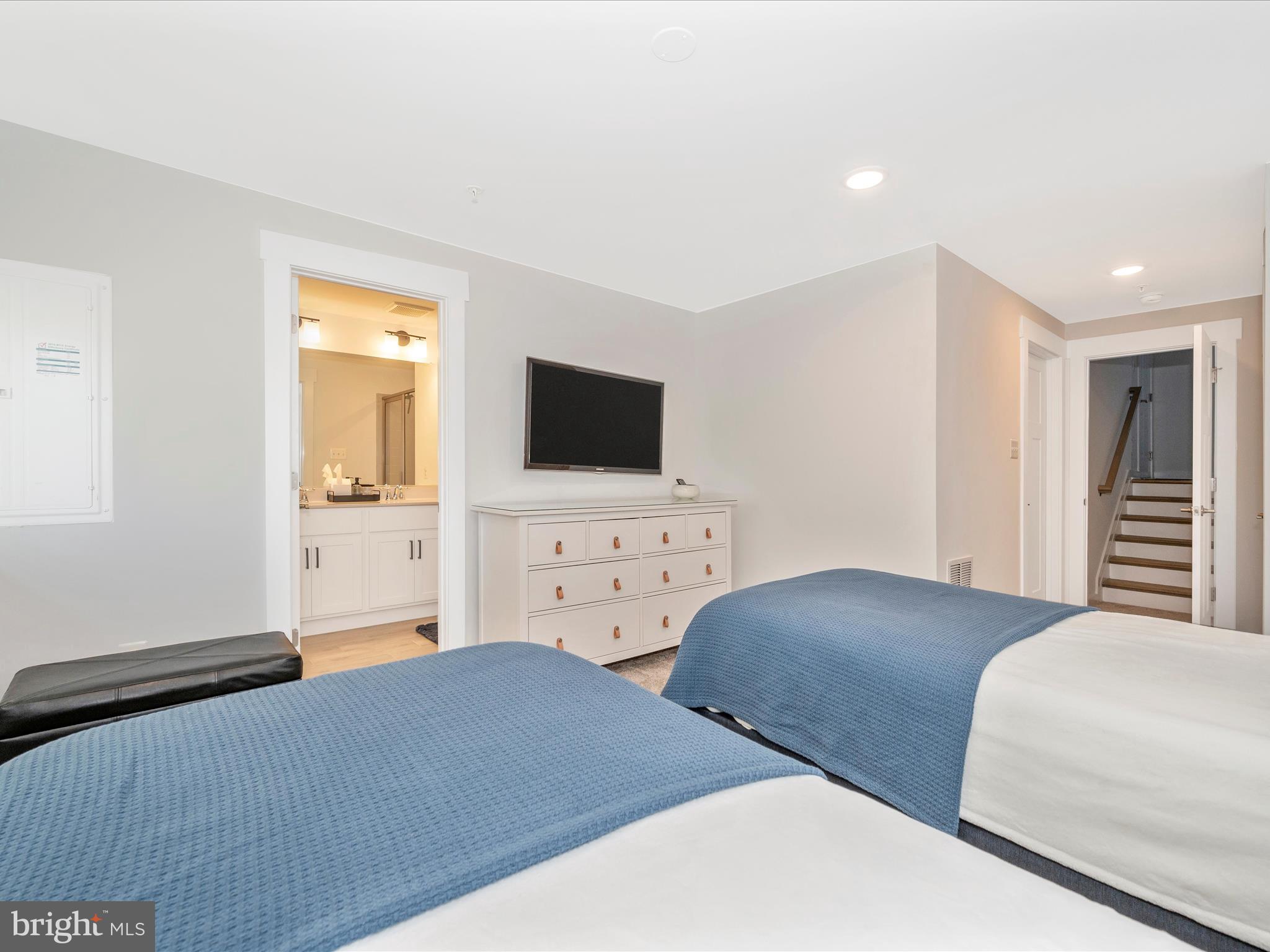 740 Tatum Court Frederick, MD 21702 - Photo 39 of 53 a bedroom with a bed and a flat screen tv