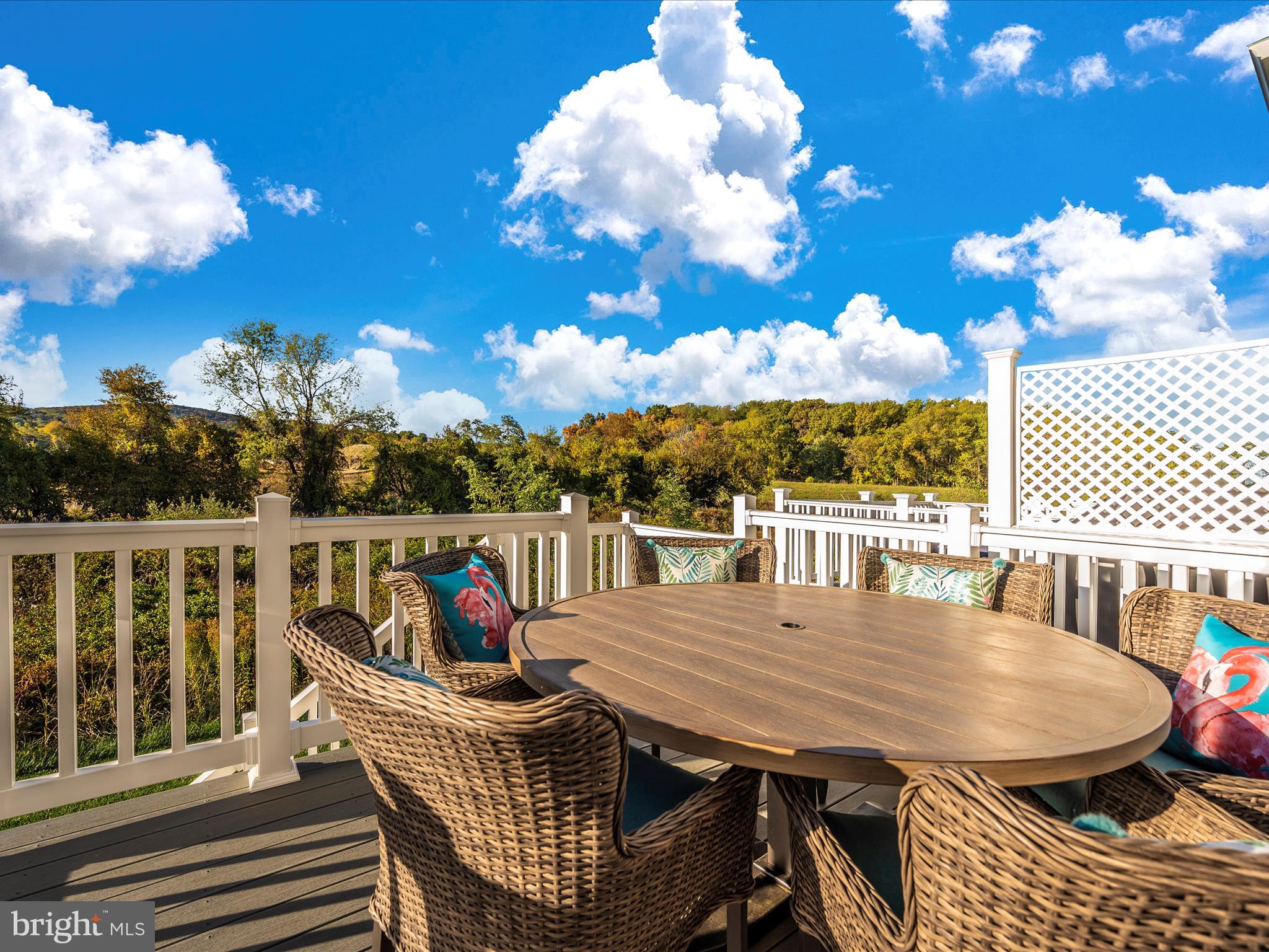 740 Tatum Court Frederick, MD 21702 - Photo 50 of 53 a view of a balcony dining space with furniture