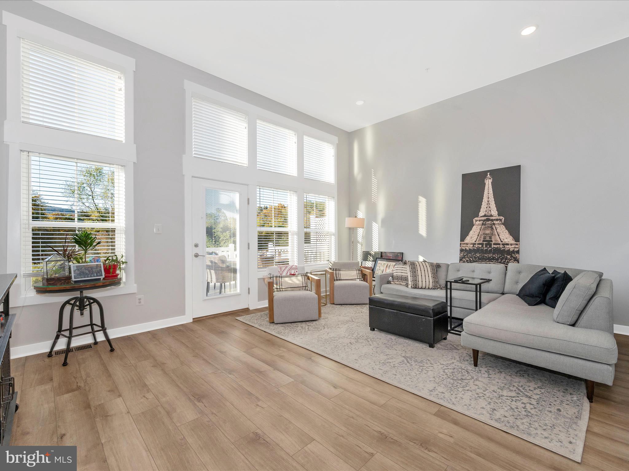 740 Tatum Court Frederick, MD 21702 - Photo 5 of 53 a living room with furniture and floor to ceiling windows
