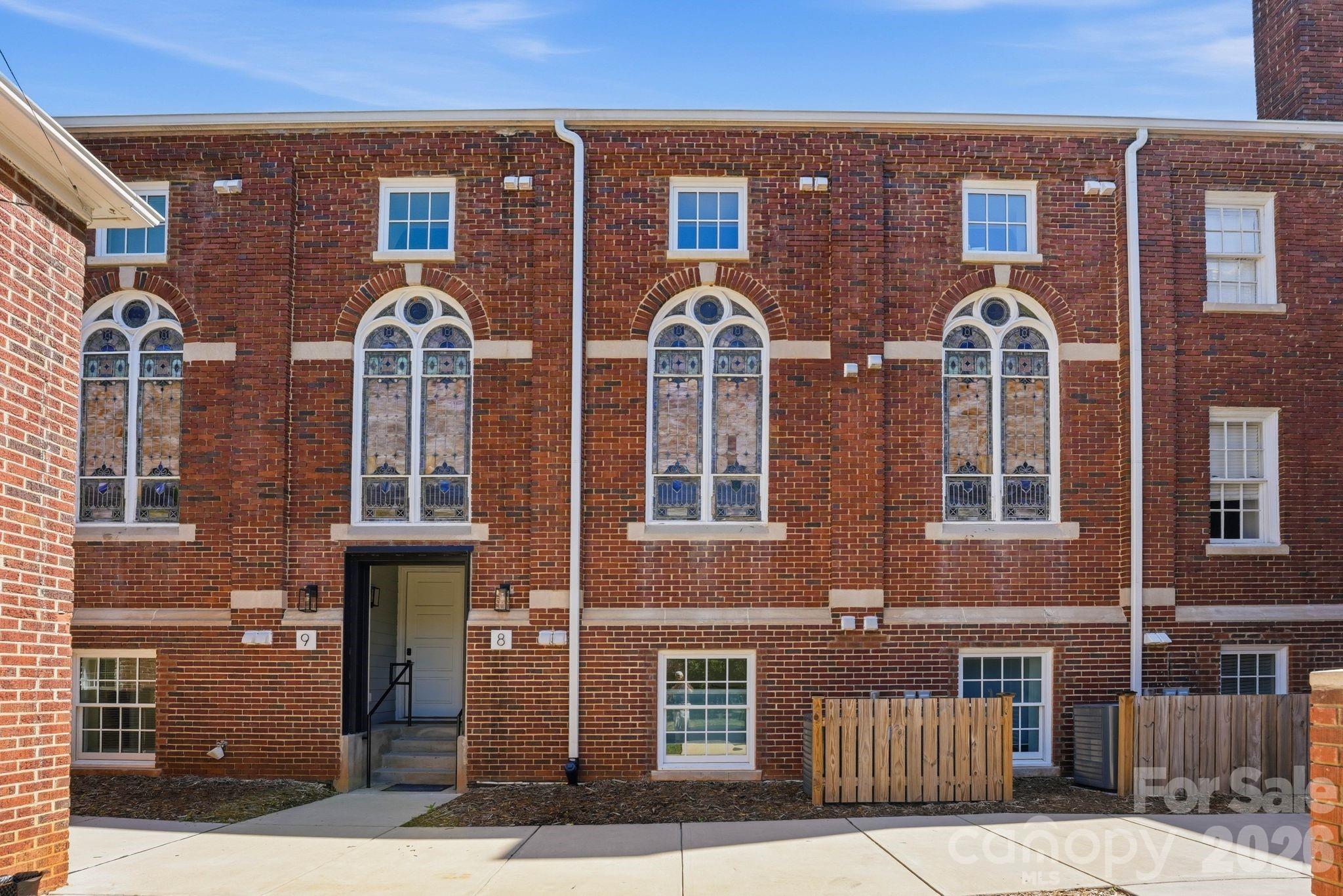 203 Grandin Road, Unit 2 Charlotte, NC 28208 - Photo 18 of 48 front view of a brick building