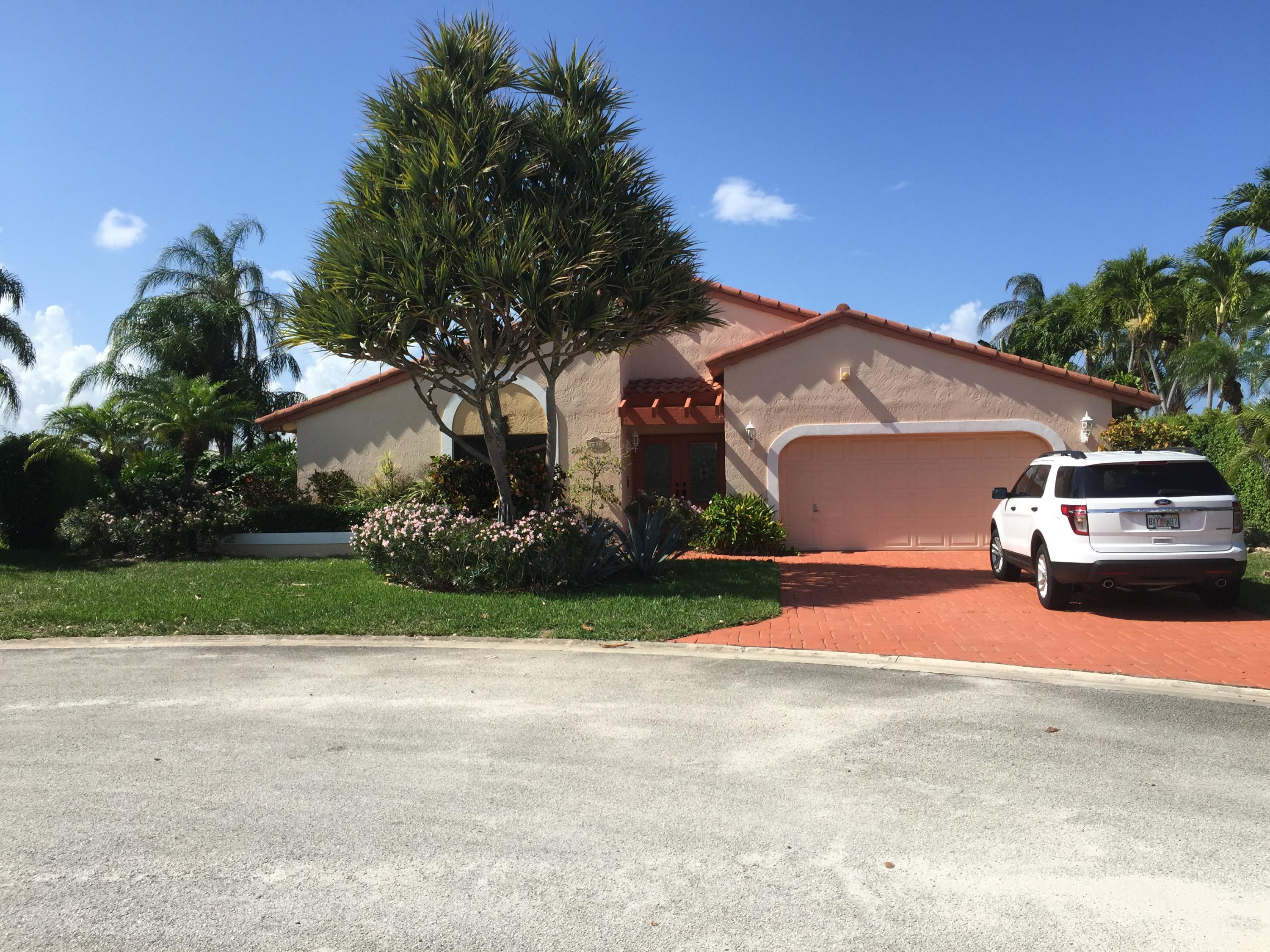 257 Northwest 70th Street Boca Raton, FL 33487 - Photo 1 of 7 front of house