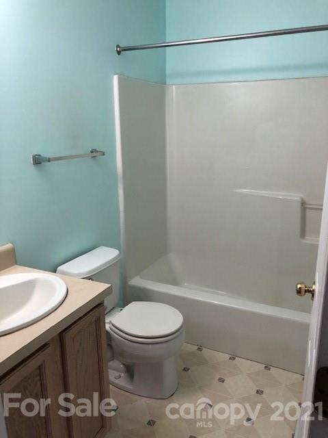 290 Sutton Spring Road York, SC 29745 - Photo 12 of 15 a bathroom with a sink a toilet and shower