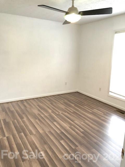 290 Sutton Spring Road York, SC 29745 - Photo 13 of 15 a view of a room with wooden floor