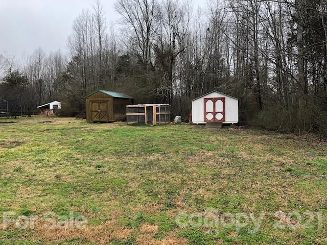 290 Sutton Spring Road York, SC 29745 - Photo 15 of 15 a view of a house with a yard