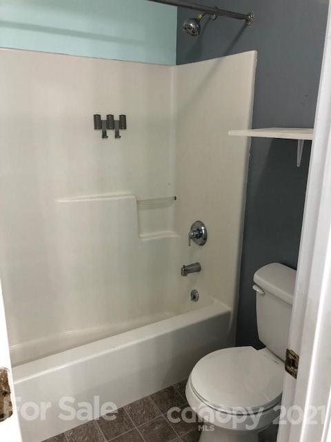 290 Sutton Spring Road York, SC 29745 - Photo 4 of 15 a white toilet sitting next to a bath tub