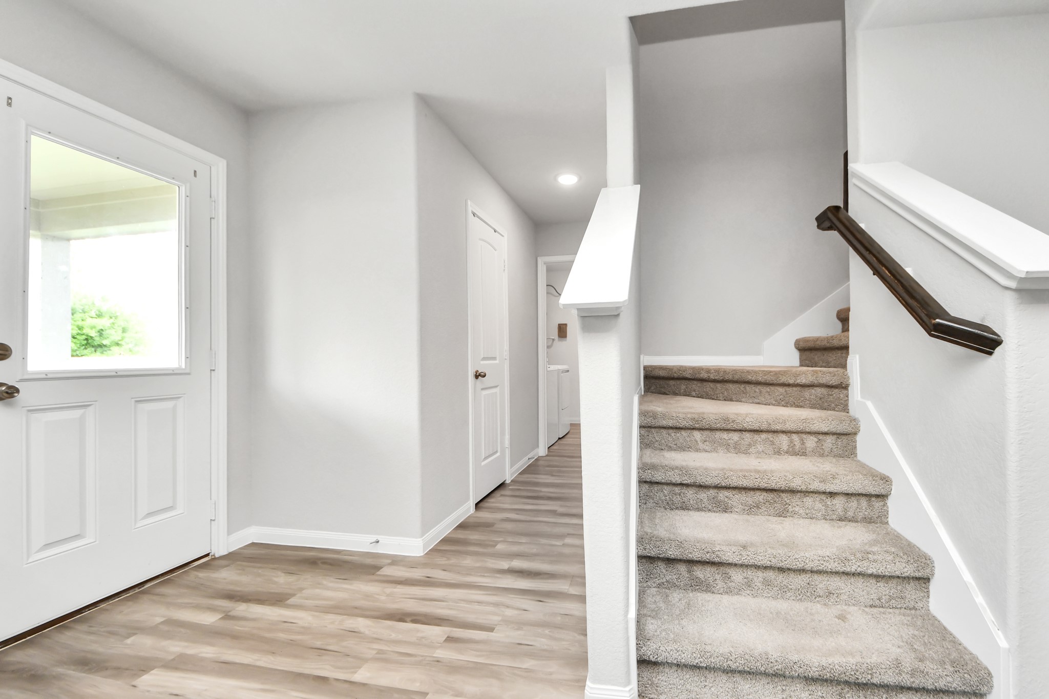 1908 Bellview Street La Marque, TX 77568 - Photo 10 of 33 looking towards the half bath and utility room from the kitchen