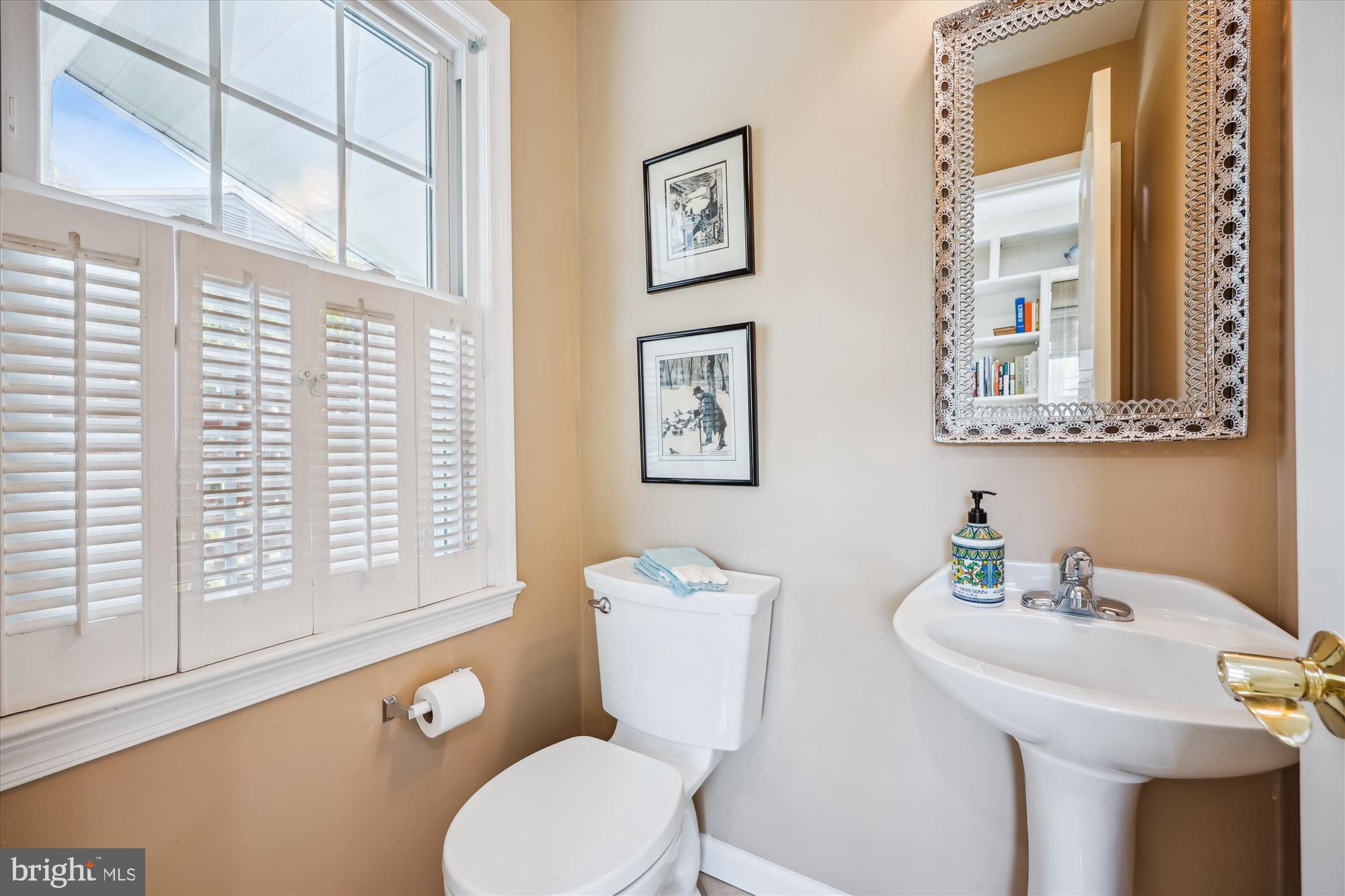 2183 Stratton Drive Potomac, MD 20854 - Photo 24 of 48 a bathroom with a toilet a sink and a window