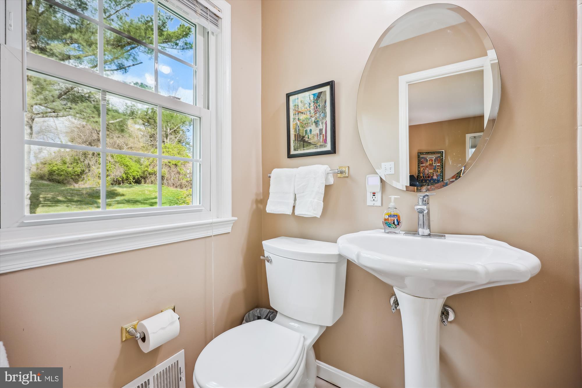 2183 Stratton Drive Potomac, MD 20854 - Photo 29 of 48 a bathroom with a sink a toilet and a window