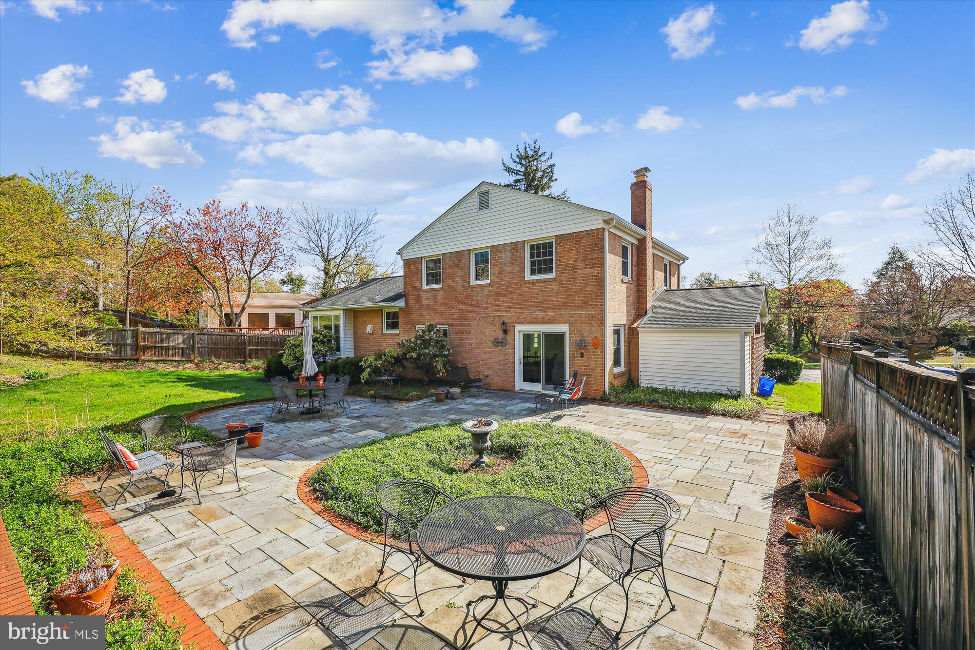 2183 Stratton Drive Potomac, MD 20854 - Photo 43 of 48 a front view of a house with garden
