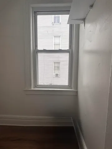 a view of empty room with a window