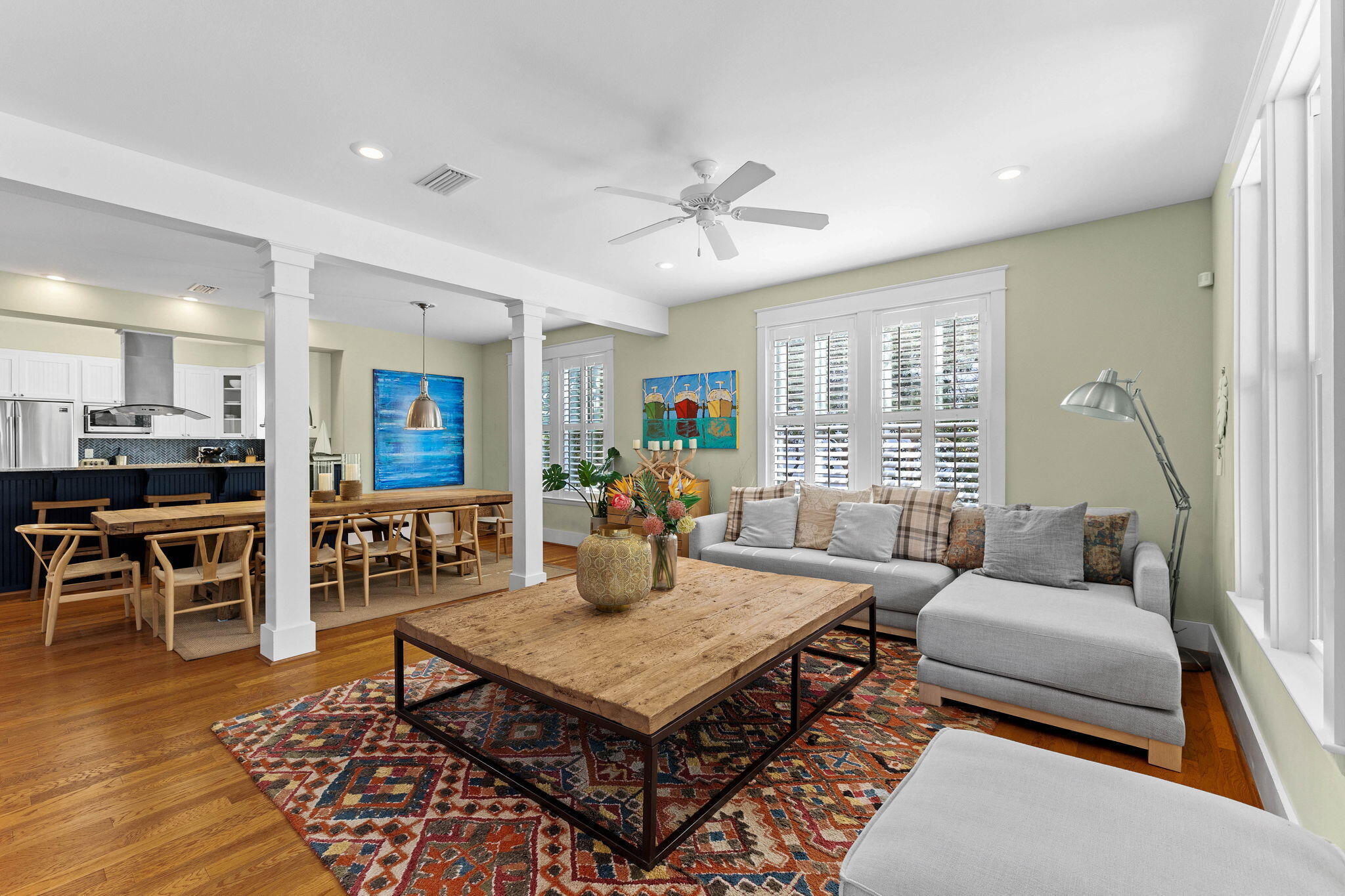 122 Sand Dunes Road Santa Rosa Beach, FL 32459 - Photo 26 of 72 a living room with furniture a table and kitchen view
