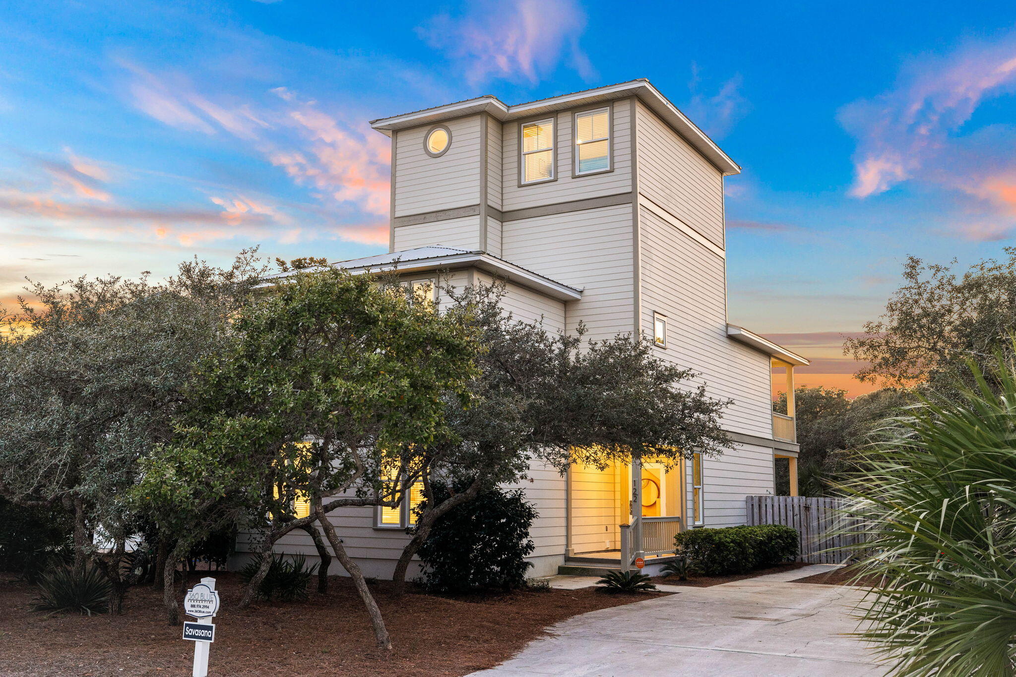 122 Sand Dunes Road Santa Rosa Beach, FL 32459 - Photo 6 of 72 a front view of a house with a yard