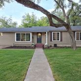 front view of a house with yard