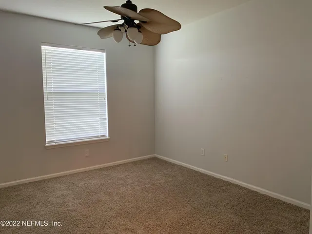 a view of a small space with a window