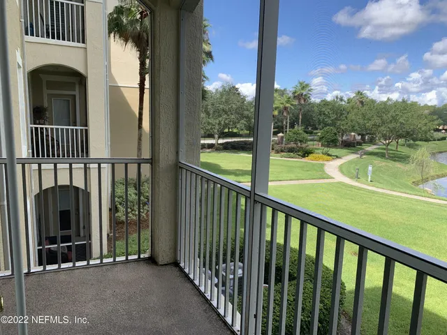 a view of a balcony with lake view