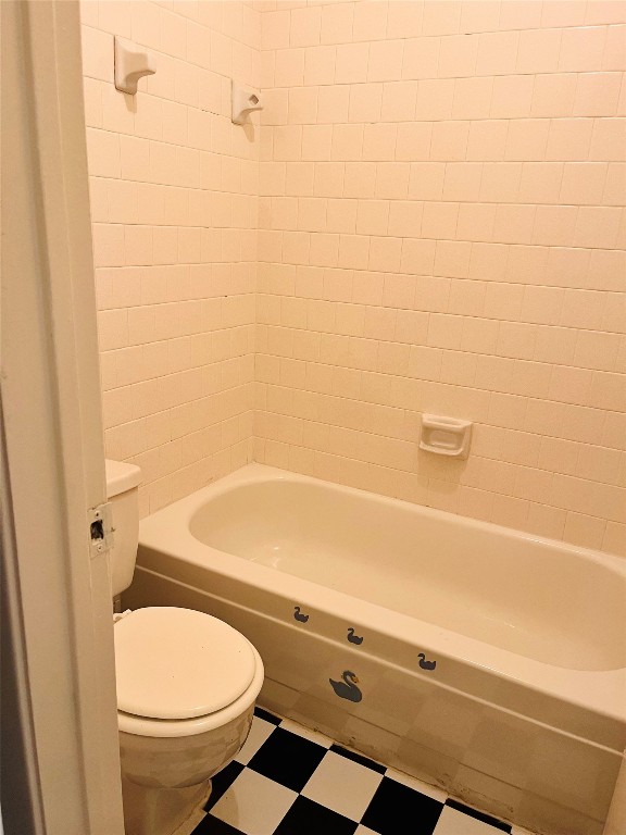 16633 Gold Ridge Lane Houston, TX 77053 - Photo 13 of 18 a bathroom with a toilet and a shower