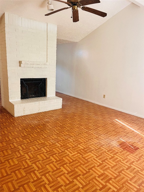 16633 Gold Ridge Lane Houston, TX 77053 - Photo 9 of 18 a view of a livingroom with a fireplace and a ceiling fan