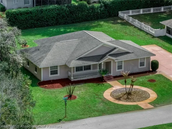 a aerial view of a house with garden