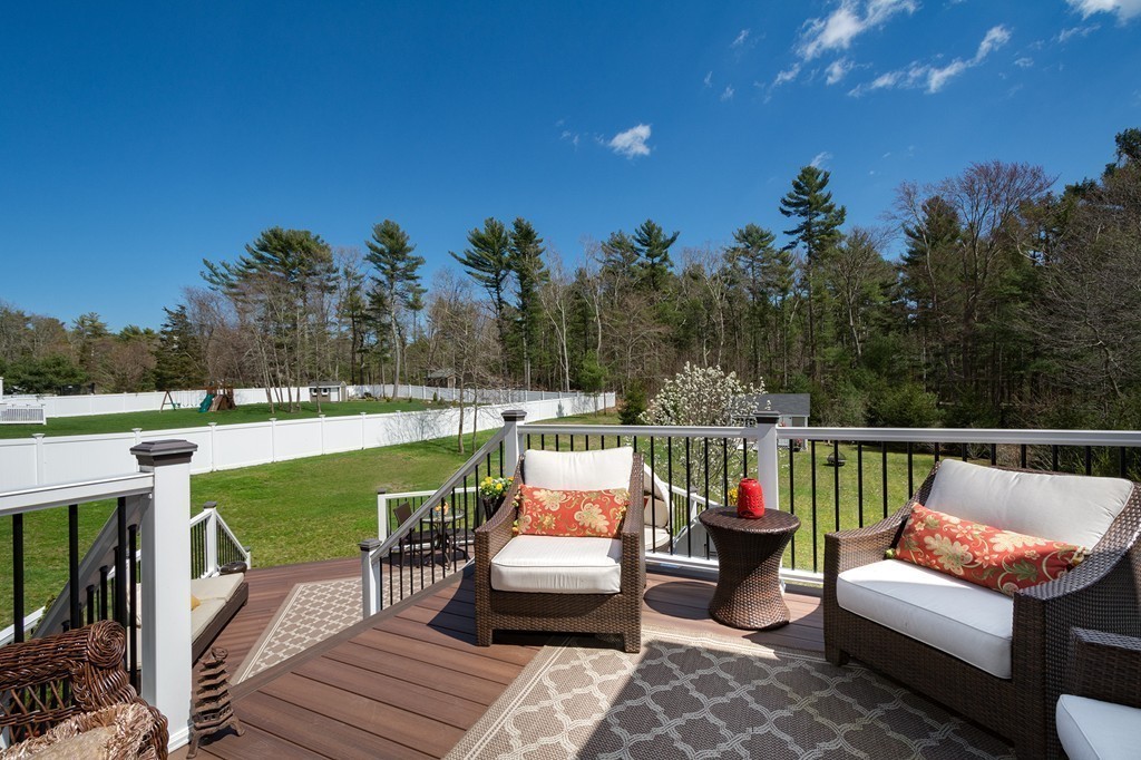 63 Saw Mill Road Duxbury, MA 02332 - Photo 12 of 29 a balcony with wooden floor and outdoor seating