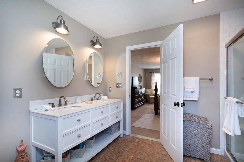 63 Saw Mill Road Duxbury, MA 02332 - Photo 20 of 29 a en suite spacious bathroom with a double vanity sink and a mirror