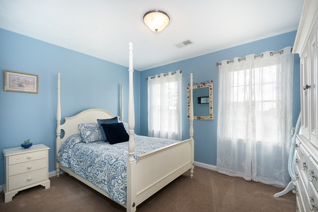 63 Saw Mill Road Duxbury, MA 02332 - Photo 22 of 29 a bedroom with a bed and window