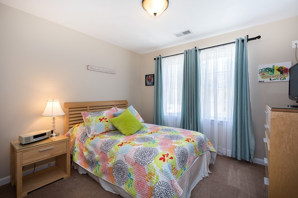 63 Saw Mill Road Duxbury, MA 02332 - Photo 24 of 29 a bedroom with a bed and a window