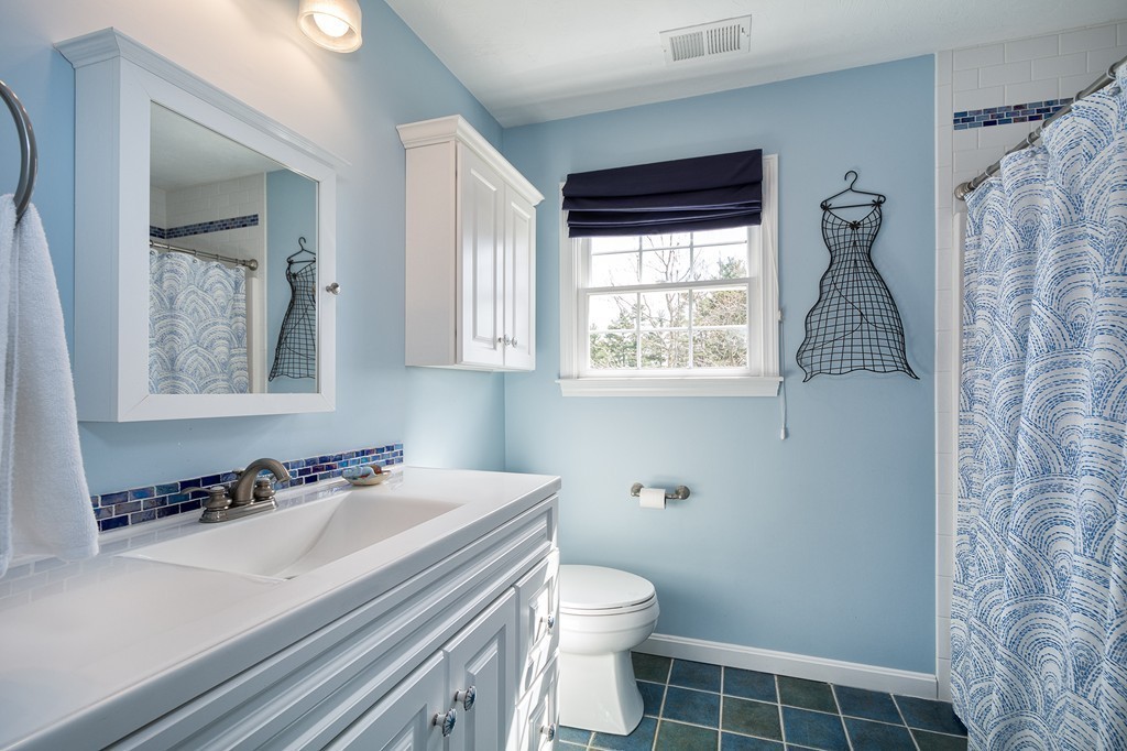 63 Saw Mill Road Duxbury, MA 02332 - Photo 26 of 29 a bathroom with a sink toilet and mirror