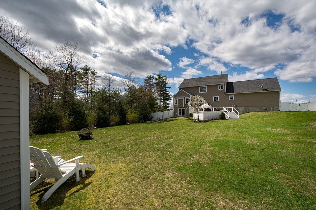 63 Saw Mill Road Duxbury, MA 02332 - Photo 29 of 29 a view of a big yard with potted plants and big trees