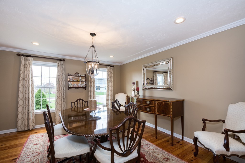 63 Saw Mill Road Duxbury, MA 02332 - Photo 4 of 29 a view of a dining room with furniture window and wooden floor