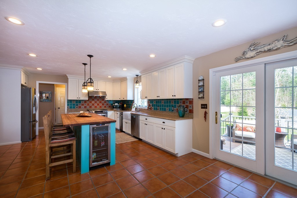 63 Saw Mill Road Duxbury, MA 02332 - Photo 8 of 29 a kitchen with stainless steel appliances granite countertop a stove a sink and a refrigerator