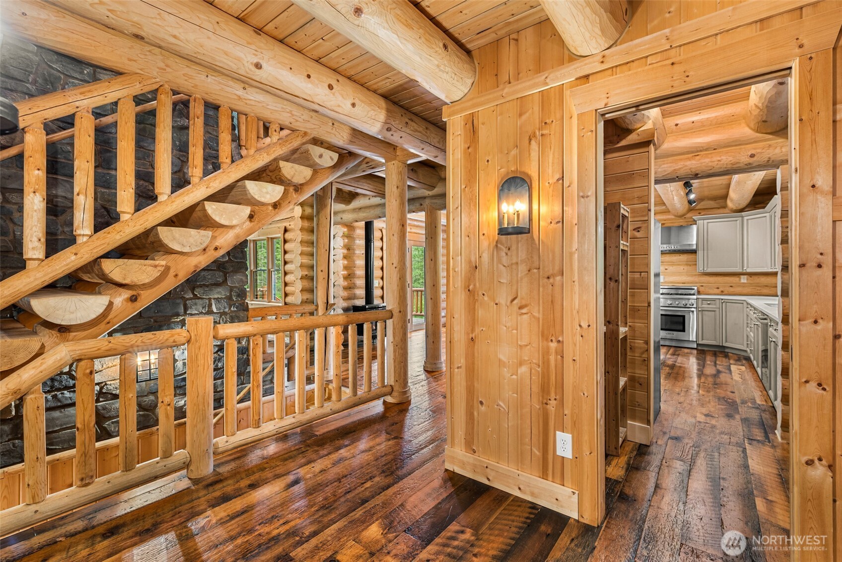 3888 Camas Creek Road Peshastin, WA 98847 - Photo 4 of 40 a view of a balcony with wooden floor and windows
