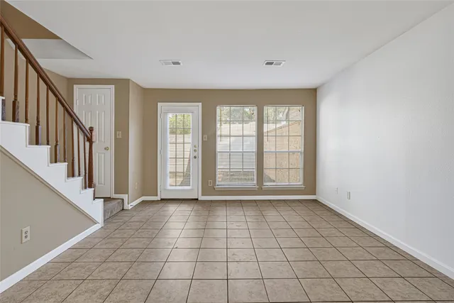 a view of an empty room with window