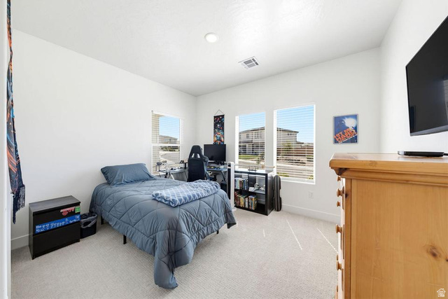 5963 Flattop Drive St. George, UT 84790 - Photo 27 of 45 Bright room featuring light-colored carpeting and white wall finishes