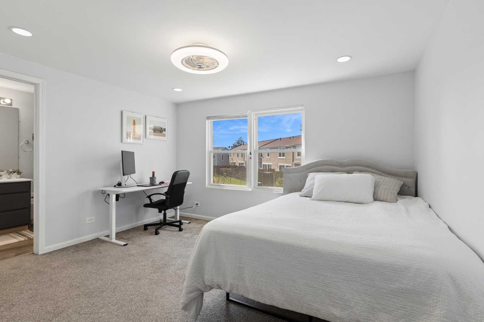 1936 Whitingham Lane Hoffman Estates, IL 60169 - Photo 15 of 23 a bedroom with a bed and a desk