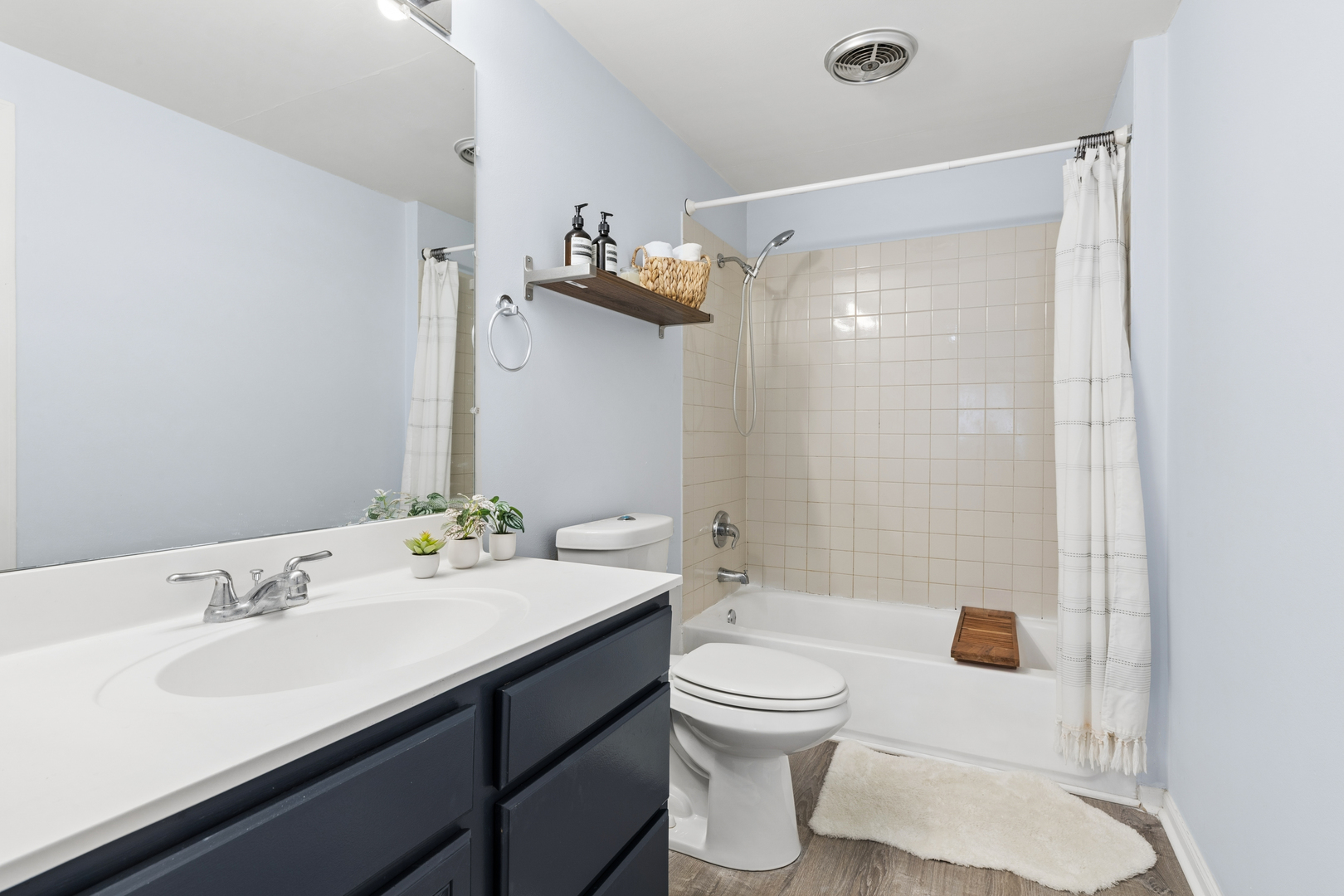 1936 Whitingham Lane Hoffman Estates, IL 60169 - Photo 16 of 23 a bathroom with a sink toilet and shower
