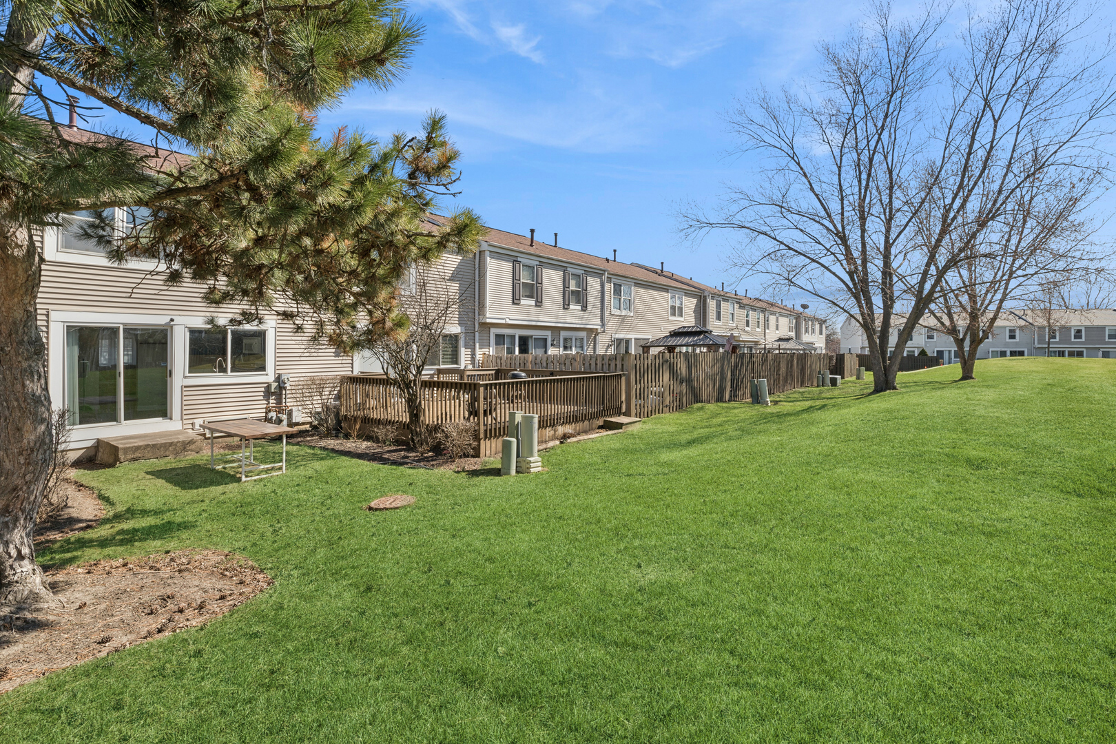 1936 Whitingham Lane Hoffman Estates, IL 60169 - Photo 20 of 23 a view of a house with a yard