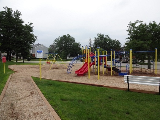 1936 Whitingham Lane Hoffman Estates, IL 60169 - Photo 22 of 23 a view of park with swings and slides