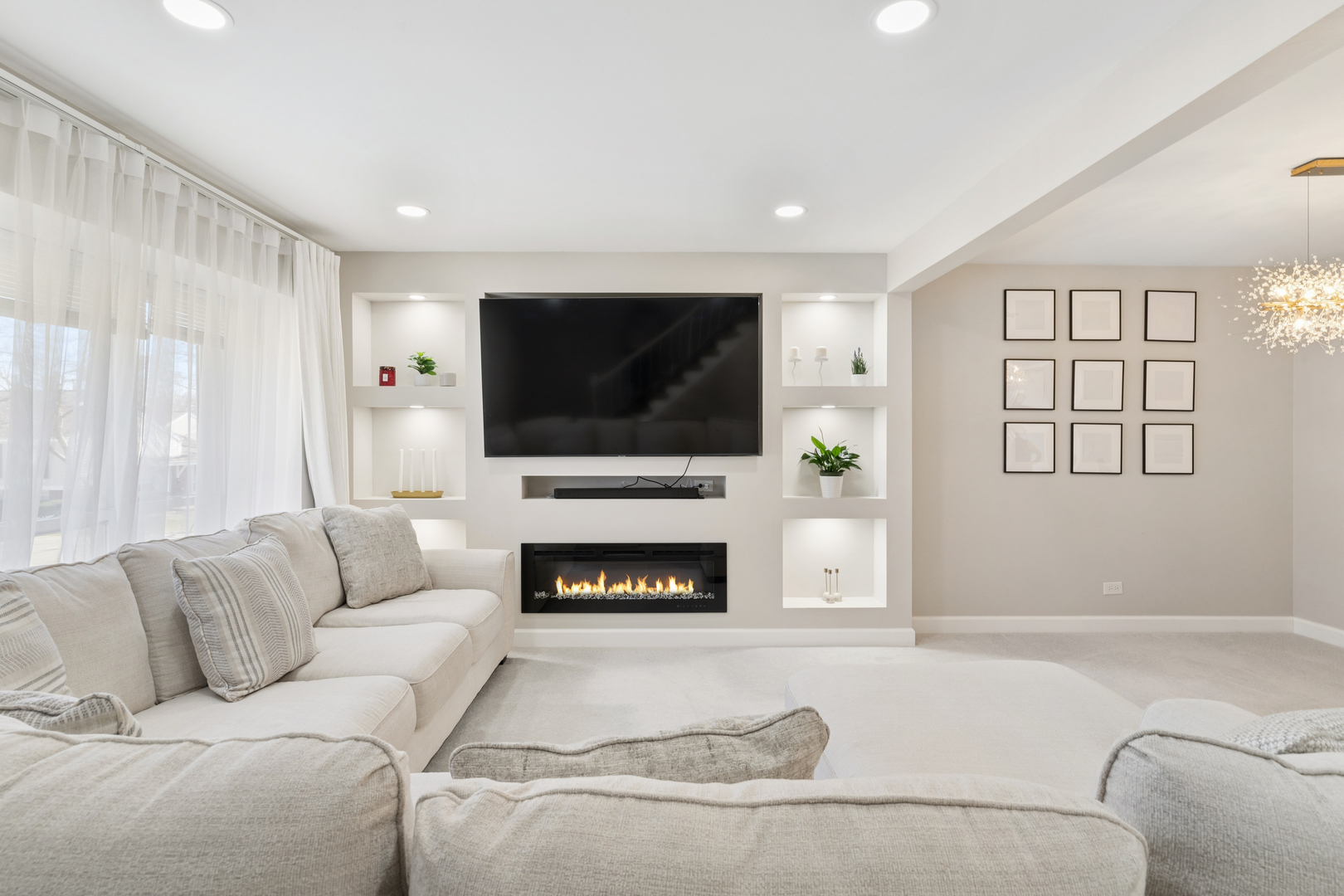 1936 Whitingham Lane Hoffman Estates, IL 60169 - Photo 4 of 23 a living room with furniture fireplace and flat screen tv