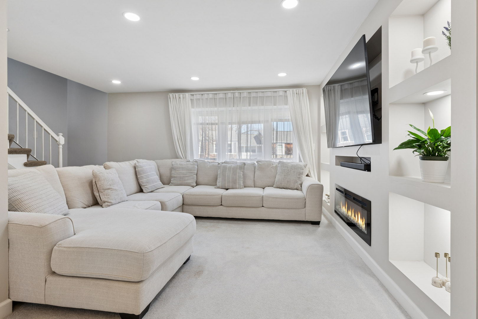 1936 Whitingham Lane Hoffman Estates, IL 60169 - Photo 8 of 23 a living room with furniture and a fireplace