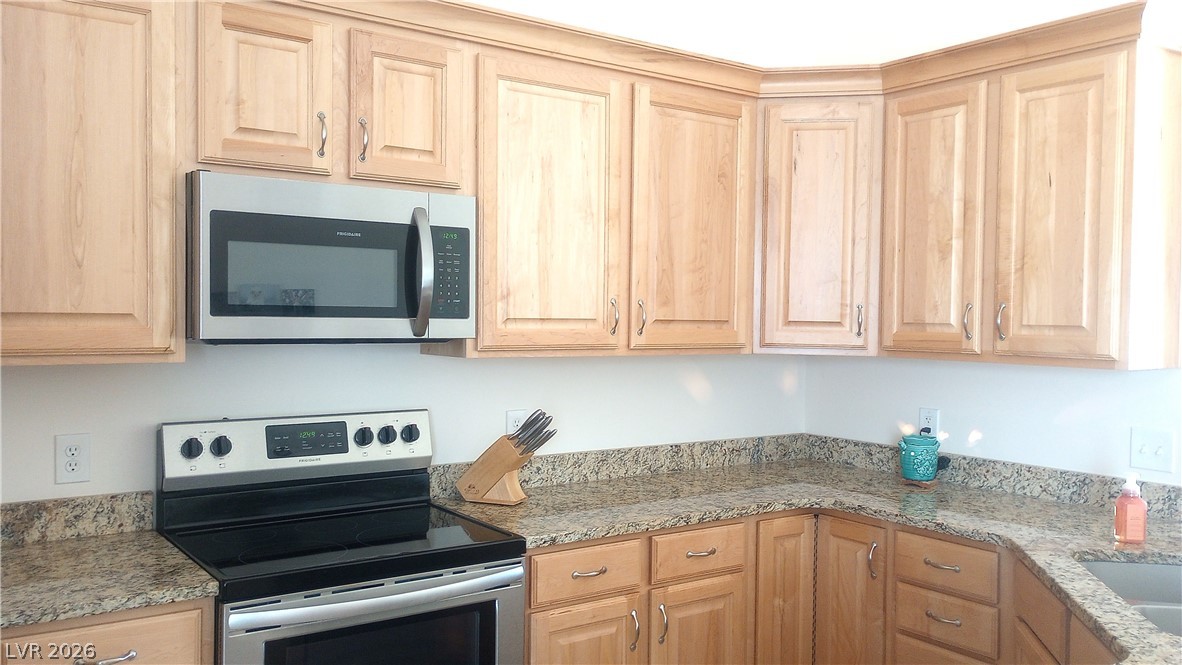 497 Airport Road Pioche, NV 89043 - Photo 11 of 20 Kitchen area - solid surface countertops and custom cabinetry