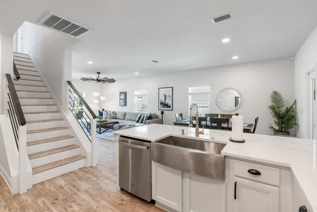 a room with a sink and a mirror