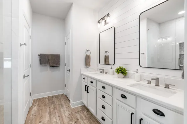 a bedroom with a bed bathroom and bathroom