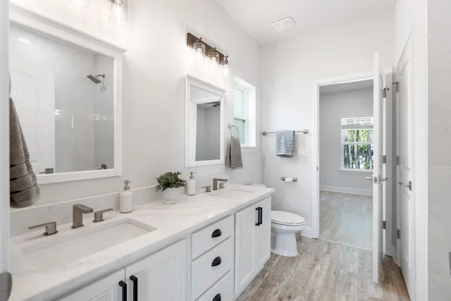 a white bath tub sitting next to a window