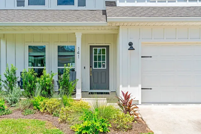 a view of a entryway door front of house