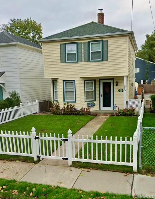 170 Birch Hill Road Locust Valley, NY 11560 - Photo 1 of 38 a front view of a house with garden