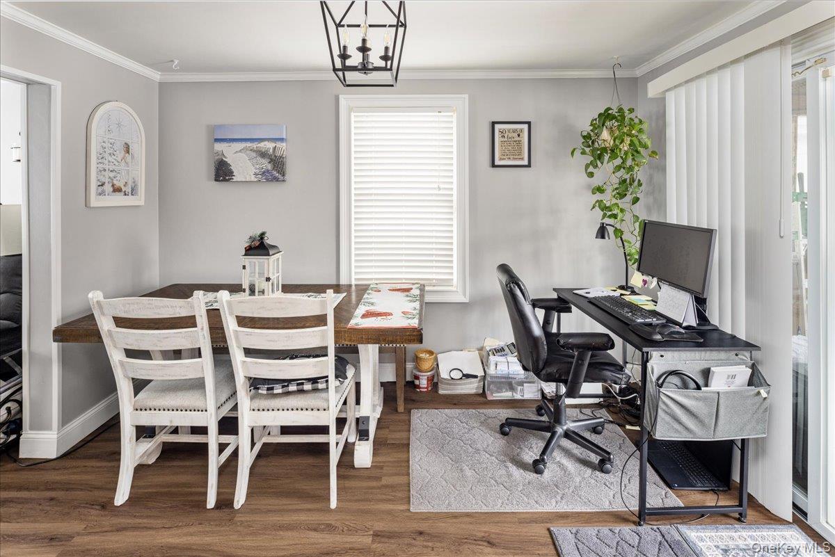 170 Birch Hill Road Locust Valley, NY 11560 - Photo 11 of 38 a view of a dining room with furniture and wooden floor
